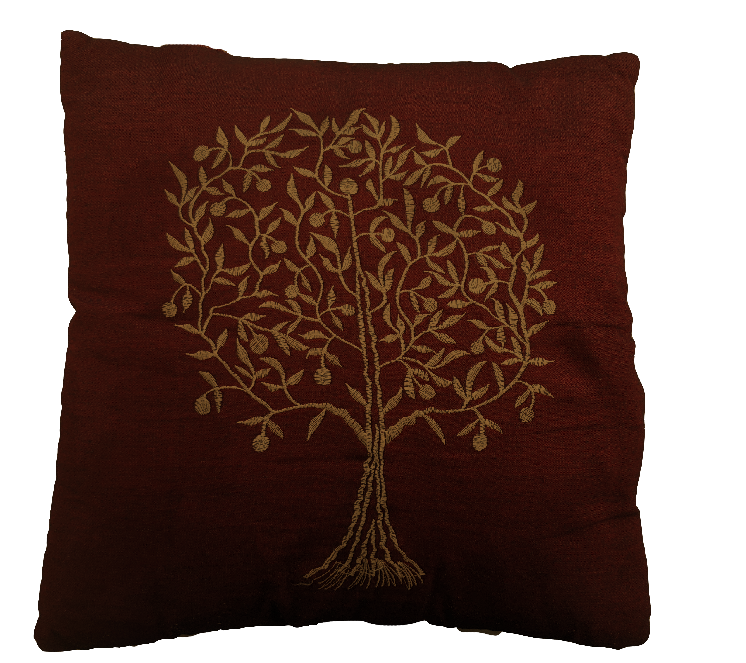 a maroon pillow with a gold tree stiched onto it